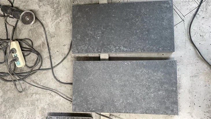 flamed black basalt tiles